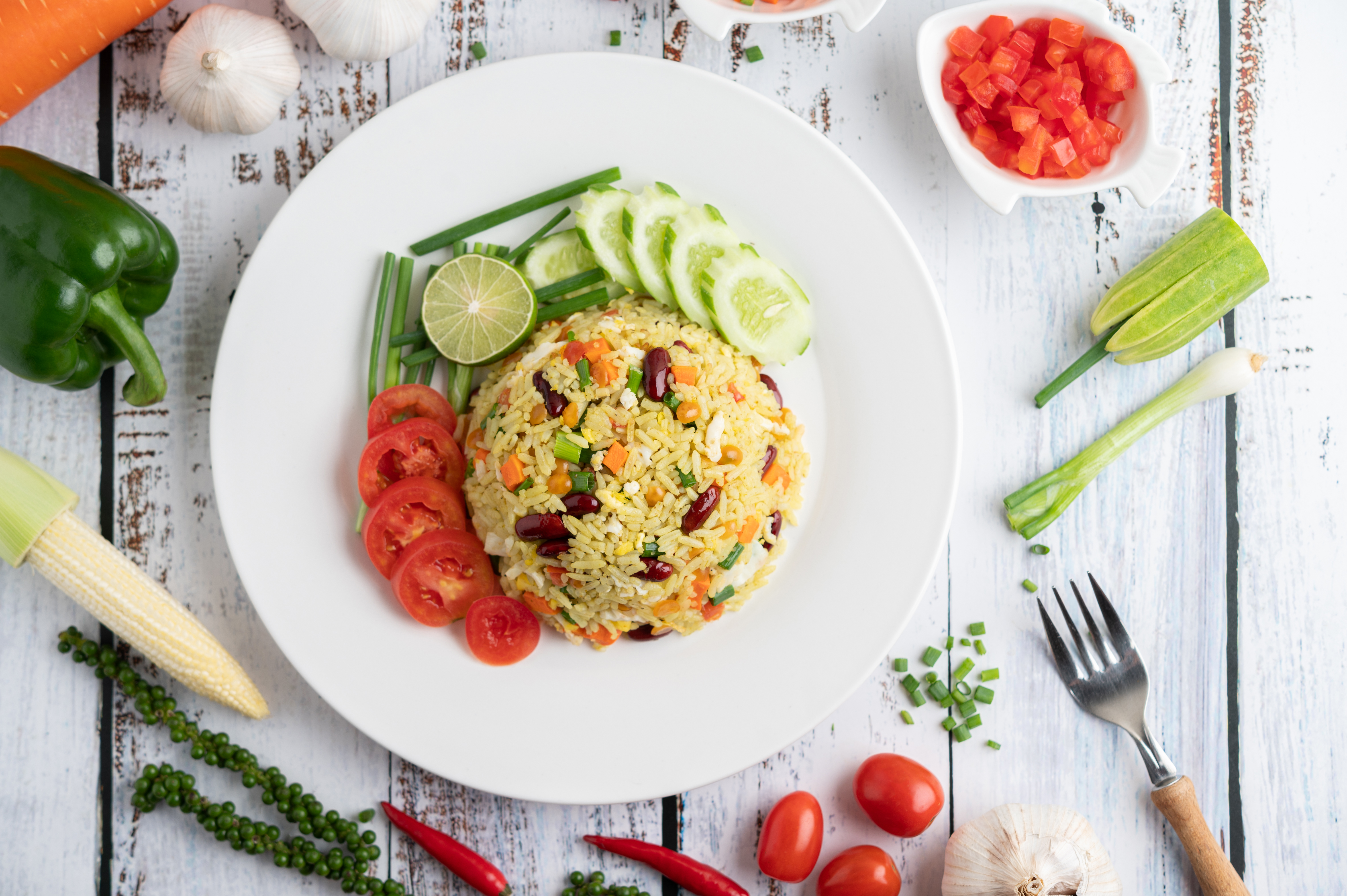 fried rice plate white wooden floor1